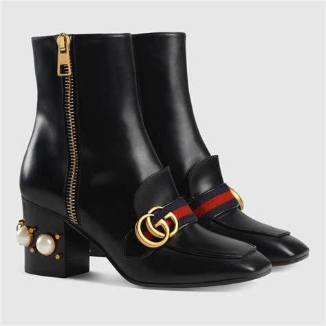 gucci boots engraved logo heel|gucci leather boots.